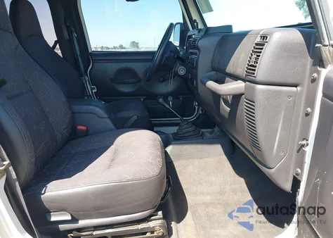 2002 Jeep Wrangler Sport z USA, uszkodzony, nr VIN 1J4FA49S62P705263